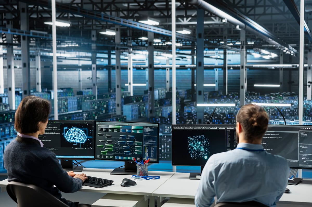 Team of data center technicians adjusting neural networks model parameters to upgrade systems
