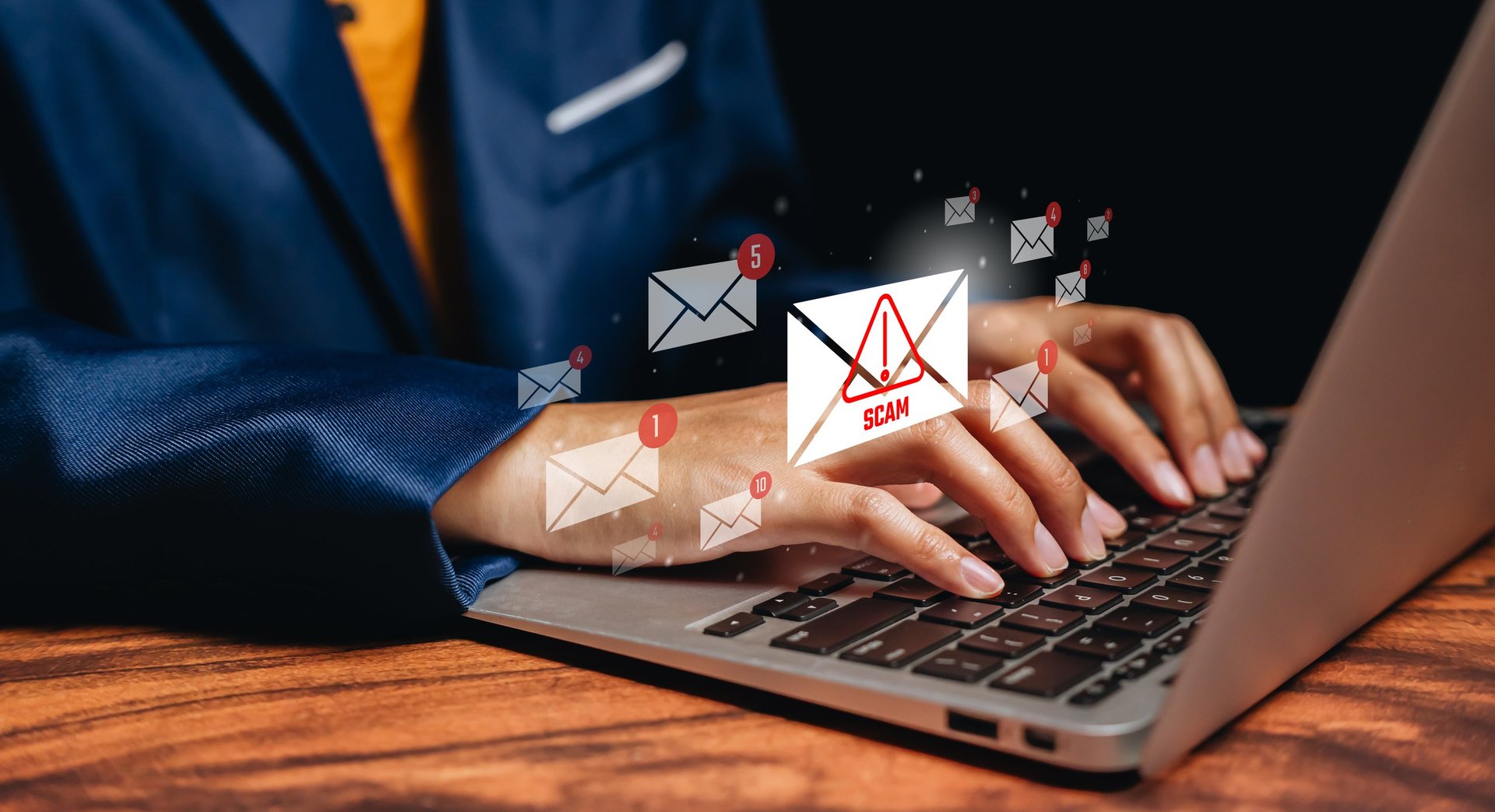 Cyber security threat concept. Business person typing laptop with scam email warning icons, phishing attack detection, online fraud prevention, digital security awareness training.