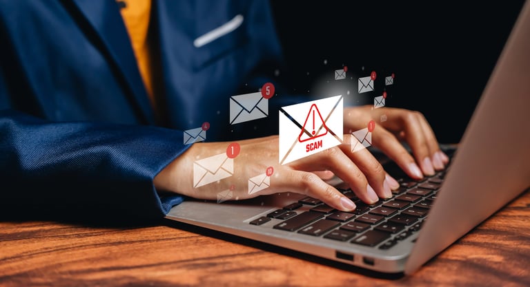 Cyber security threat concept. Business person typing laptop with scam email warning icons, phishing attack detection, online fraud prevention, digital security awareness training.