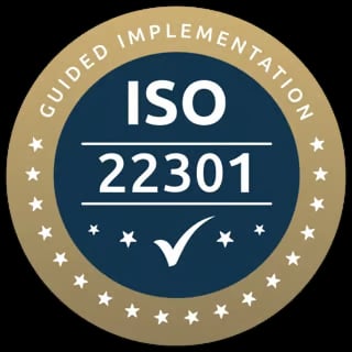 ISO 22301 Guided Implementation certification badge with checkmark on dark blue circle surrounded by gold ring